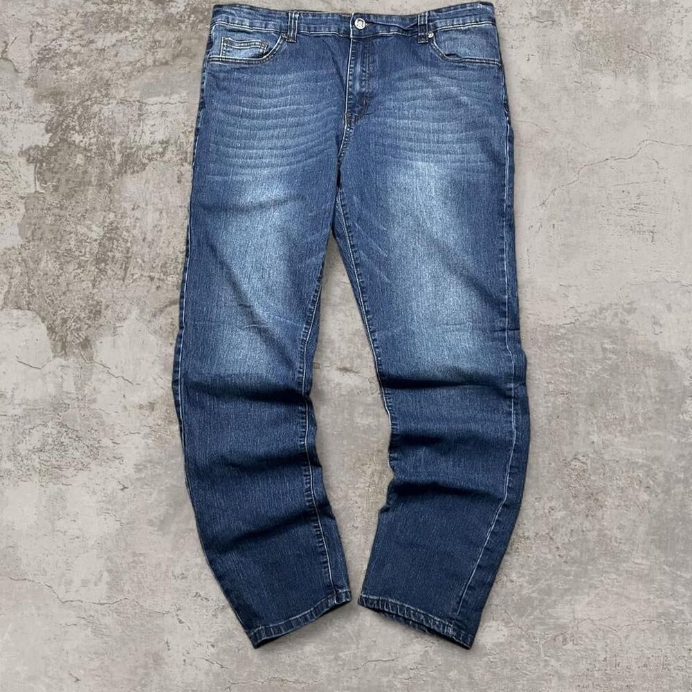 Stitches and rivets blue jeans faded baggy